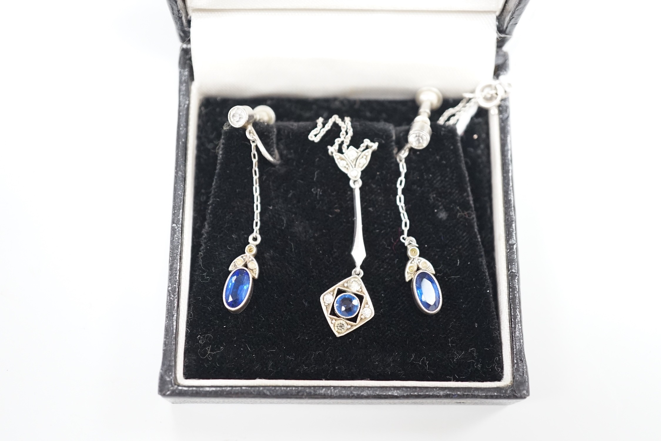 A 1920's? continental 935 white metal and two colour paste set pendant necklace, 49cm and a pair of matching drop earrings.